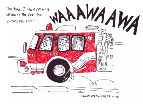 This time, I saw a fireman sitting in the fire truck covering his ears!..