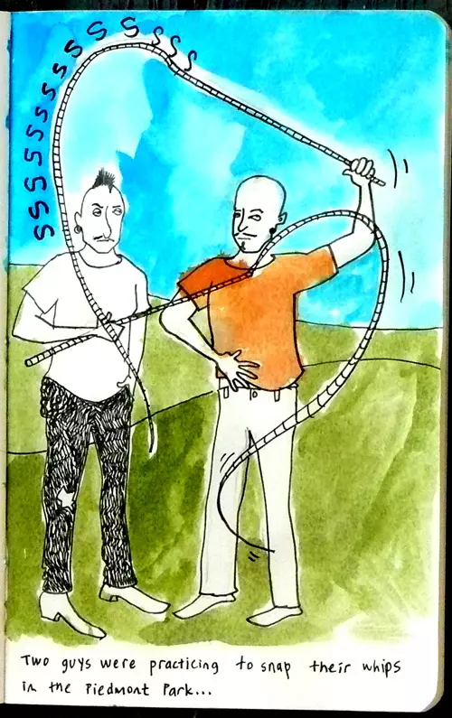 Two guys were practicing to snap their whips in the Piedmont Park...