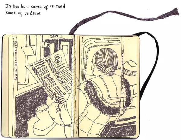 In the bus, some of us read some of us draw.