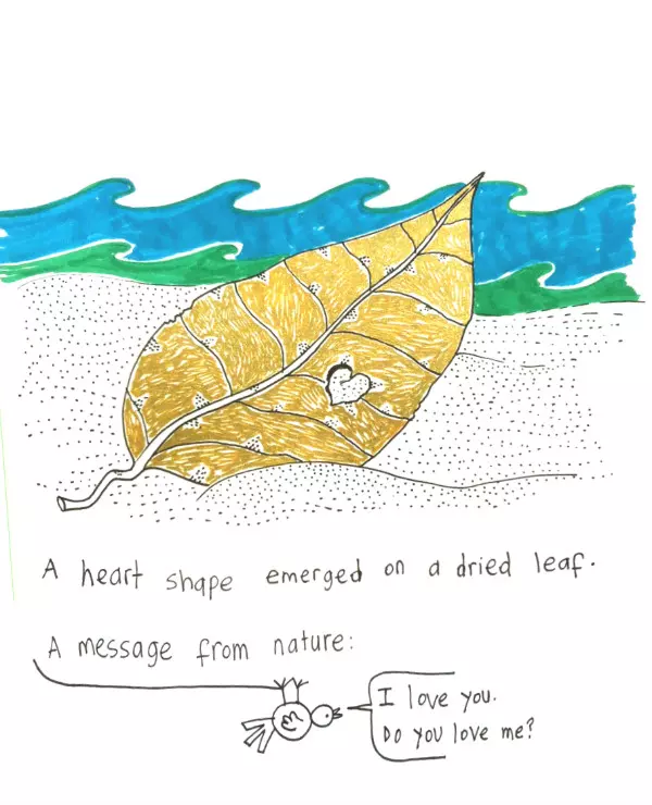 A heart shape emerged on a dried leaf. A message from nature. I love you. Do you love me?