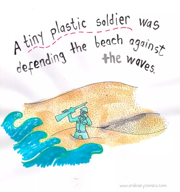 A tiny plastic soldier was defending the beach against the waves