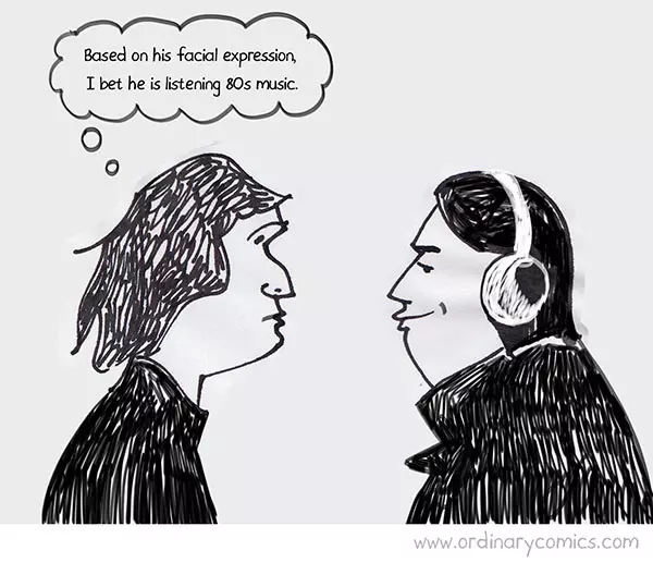 Based on his facial expression I bet he is listening 80s music.